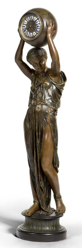 A large late 19th century French patinated spelter figural clock