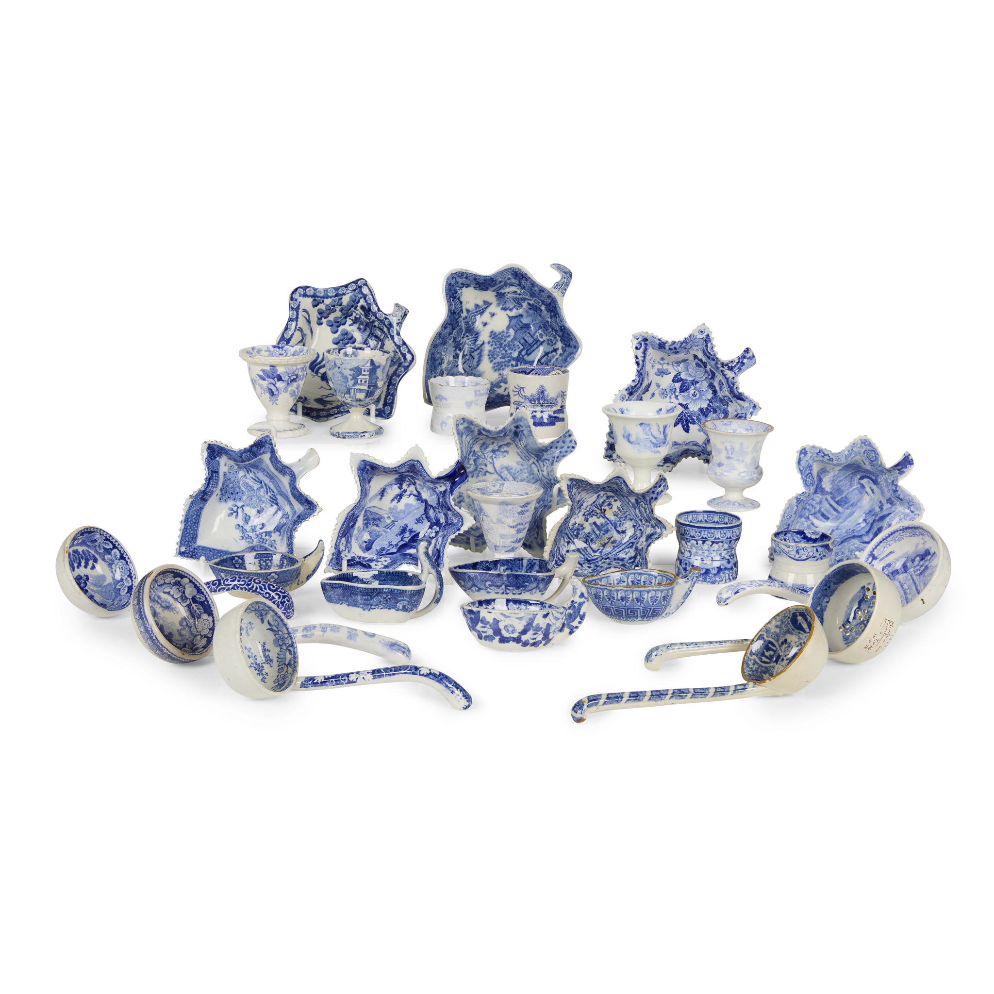 COLLECTION OF BLUE AND WHITE TRANSFER PRINTED VINE PICKLE DISHES, LADLES, EGG HOOPS AND EGG CUPS