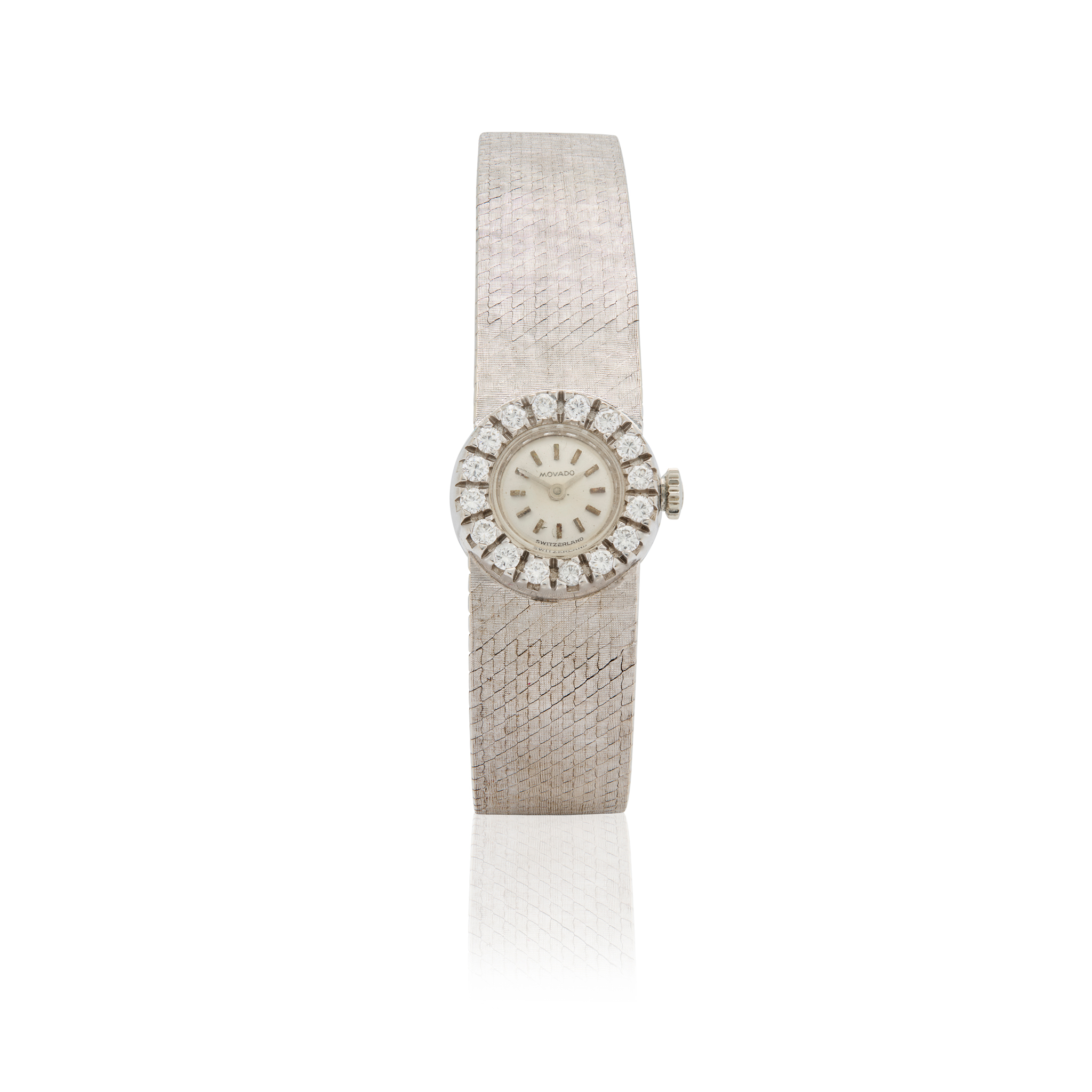 Movado. An 18k white gold and diamond Ladies mechanical bracelet watch