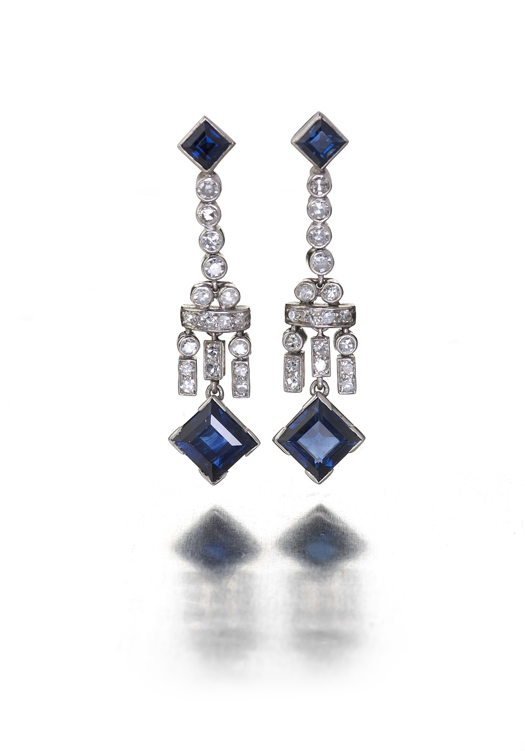 A pair of early 20th century 18ct white gold mounted pendant earrings,