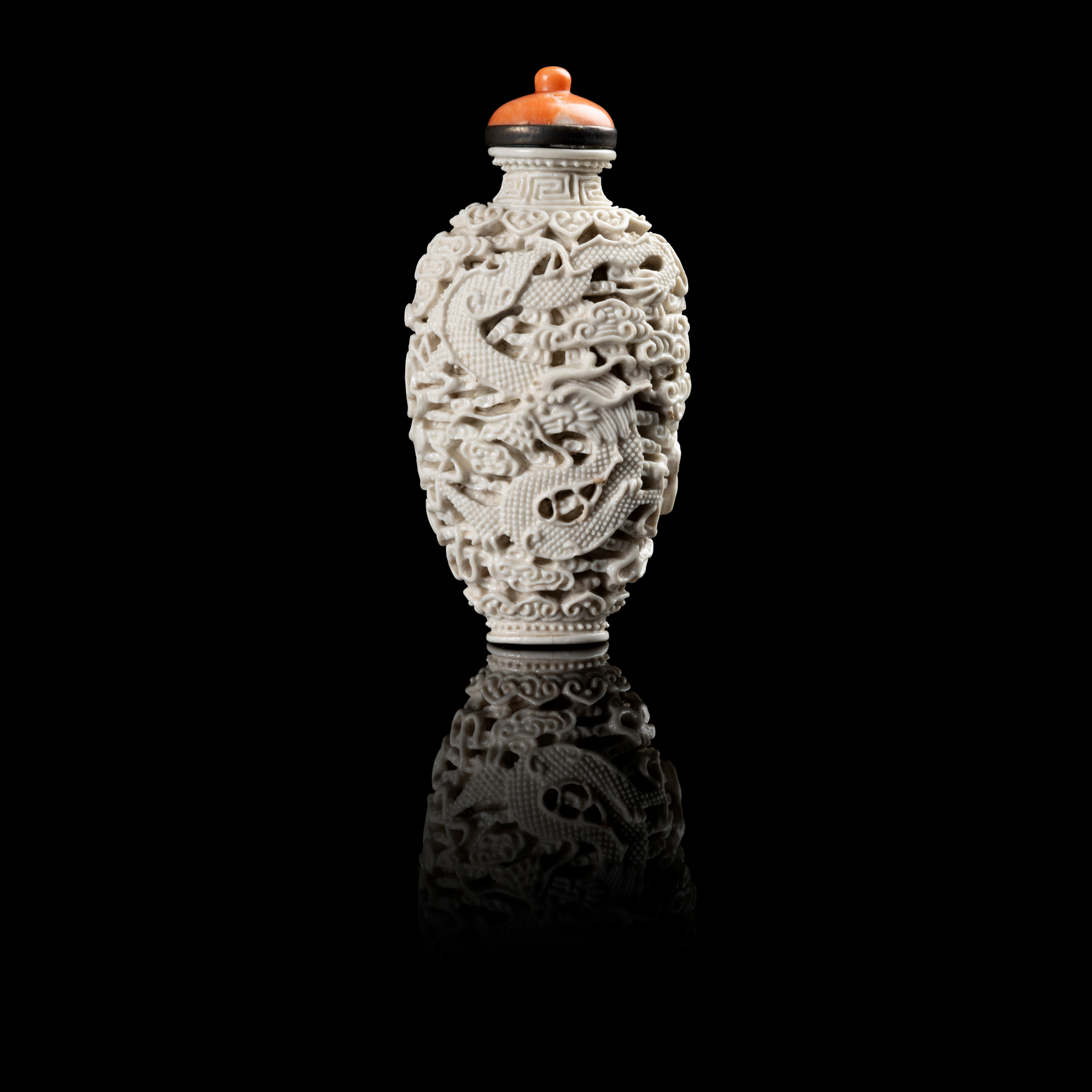 CHINESE MOULDED AND RETICULATED CARVED WHITE-ENAMELED PORCELAIN SNUFF BOTTLE