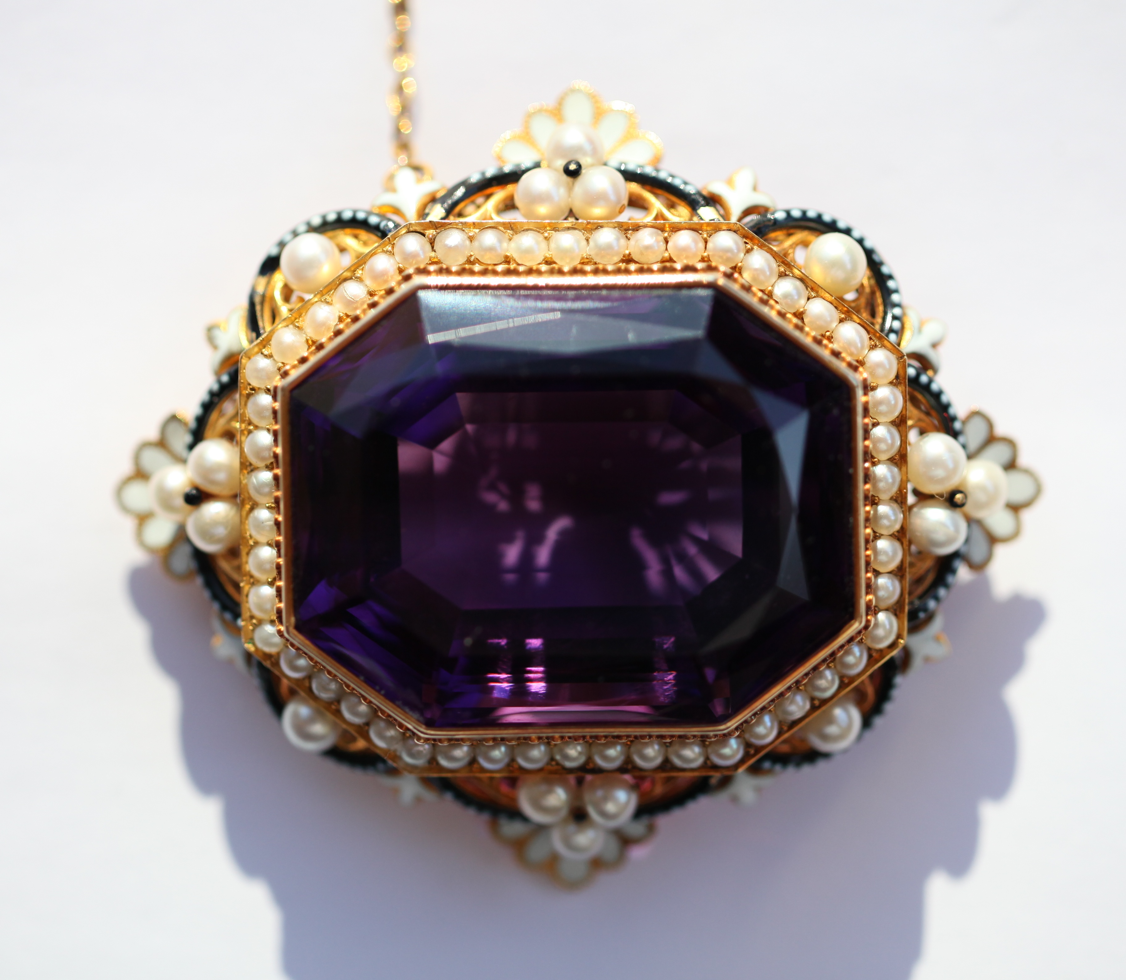 A fine early 20th century amethyst and pearl set brooch