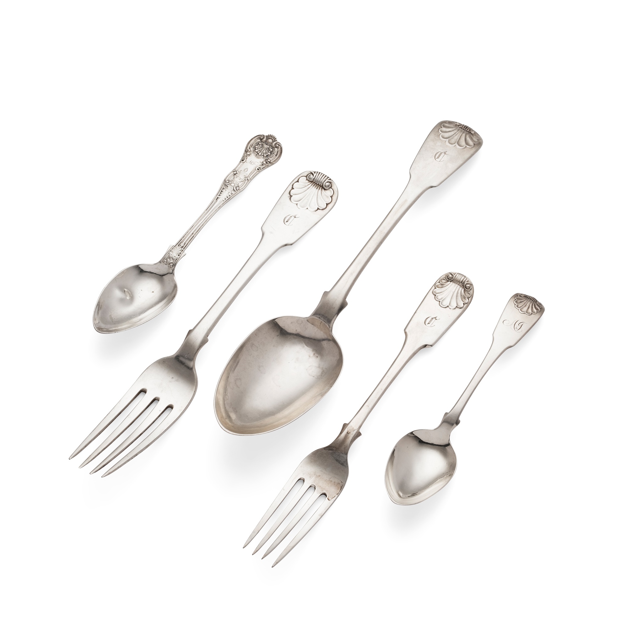 A collection of matched Fiddle and Shell pattern flatware