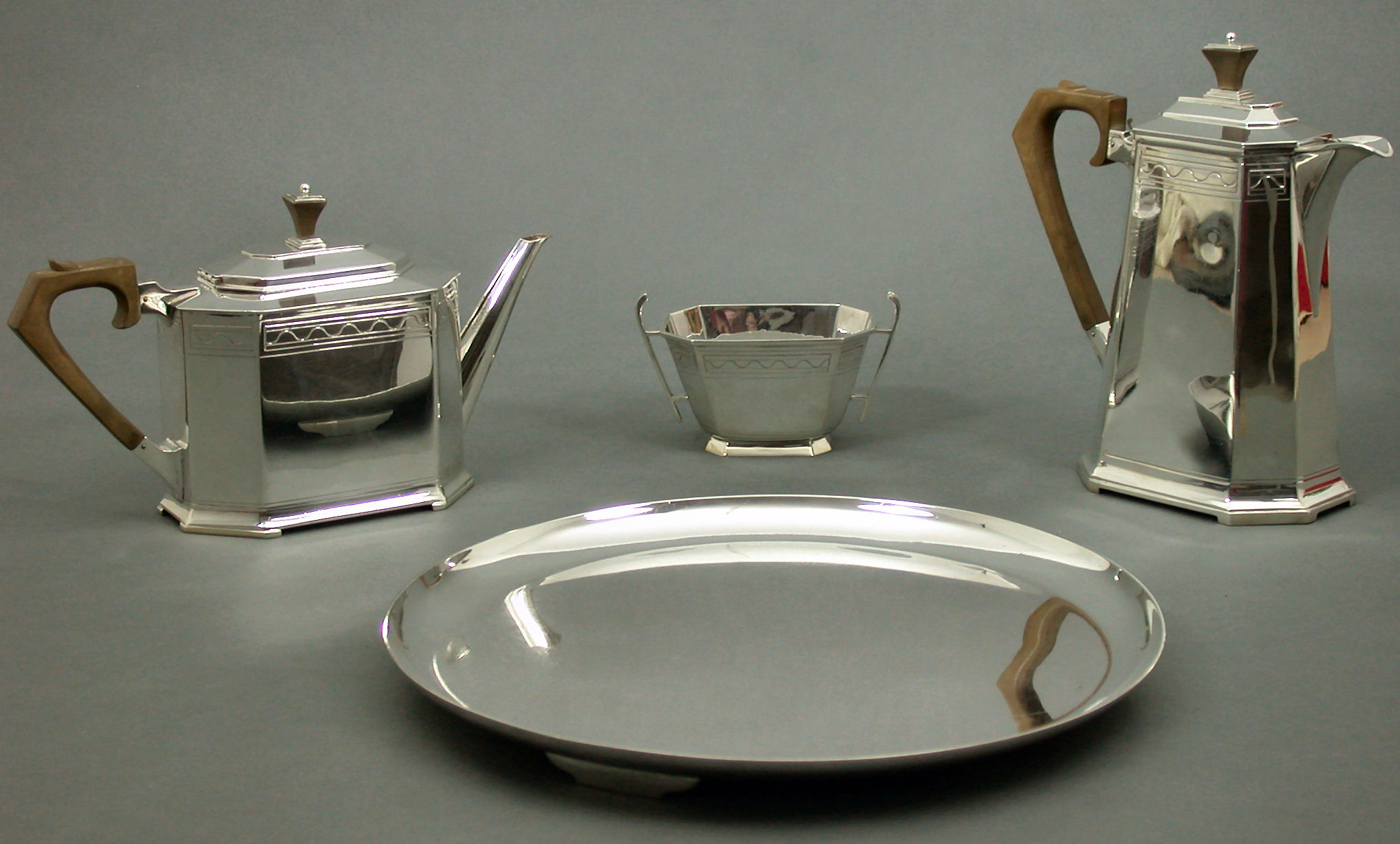 A three piece tea service,