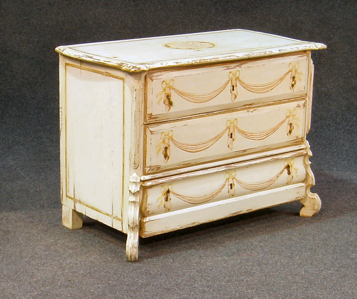 A French style white painted commode
