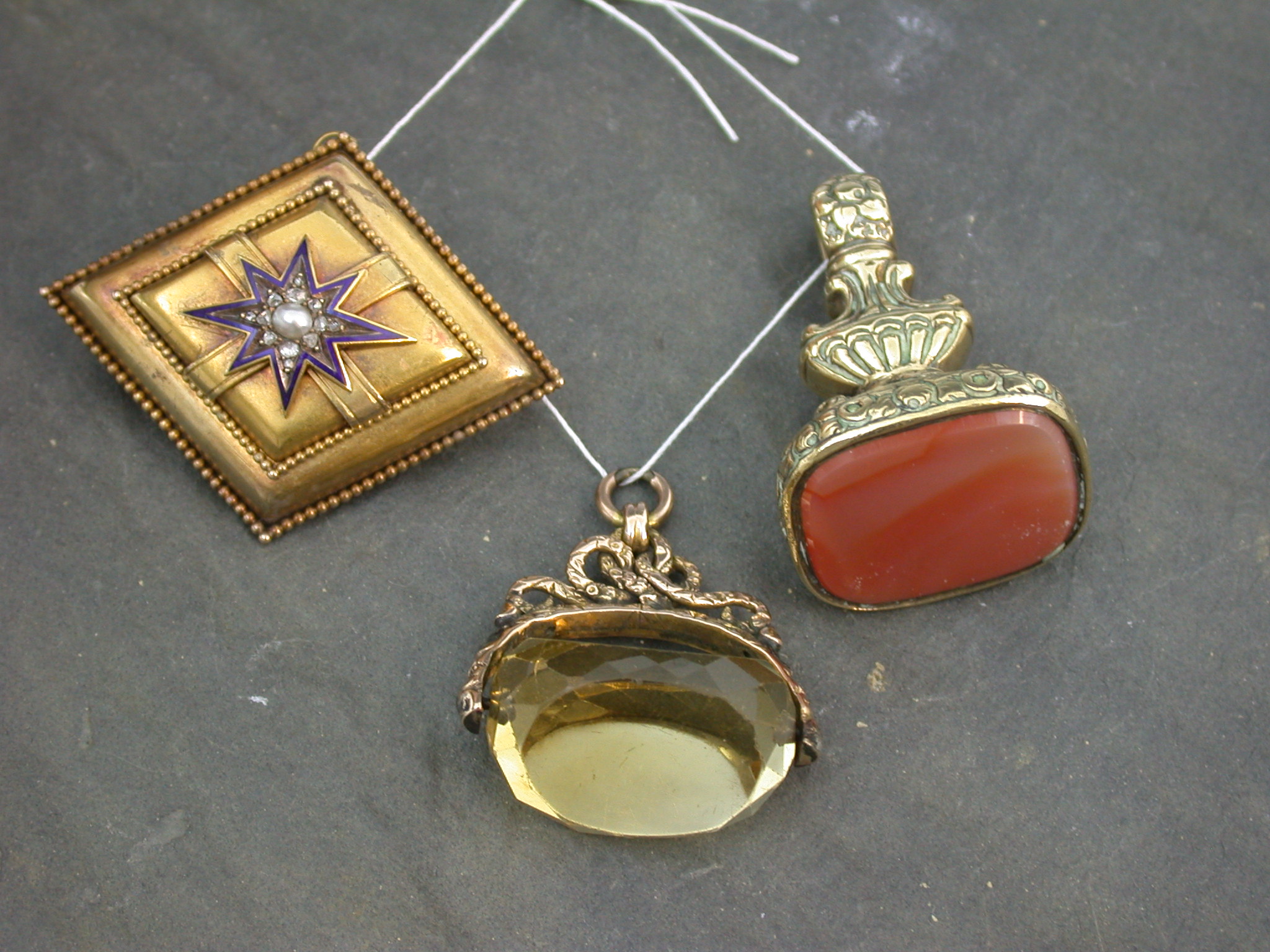 A Victorian gold lozenge shaped brooch,