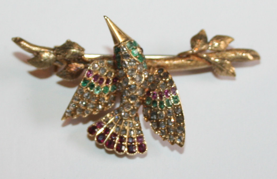 A Victorian multi gem set bird brooch