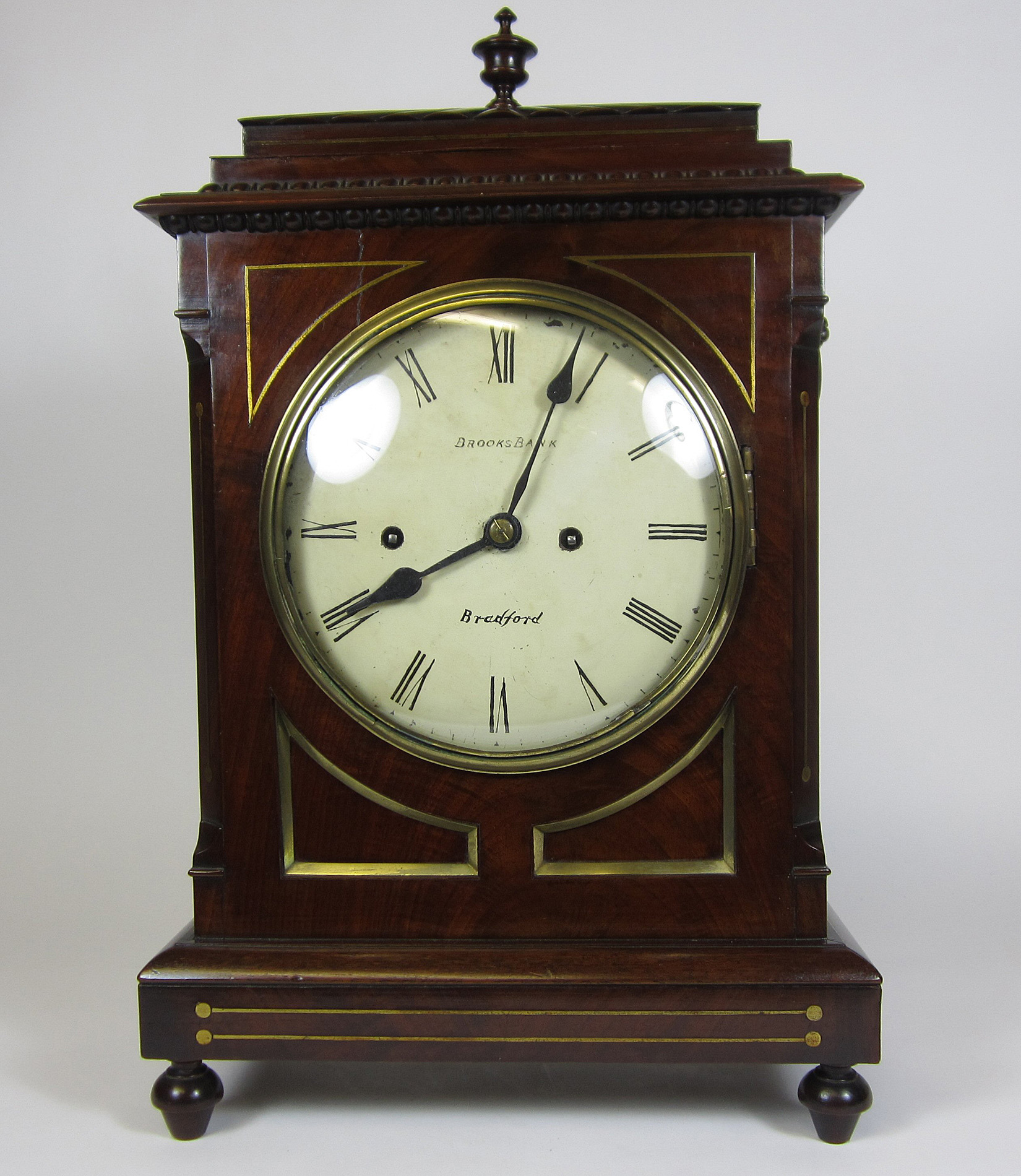 REGENCY MAHOGANY AND BRASS INLAID BRACKET CLOCK