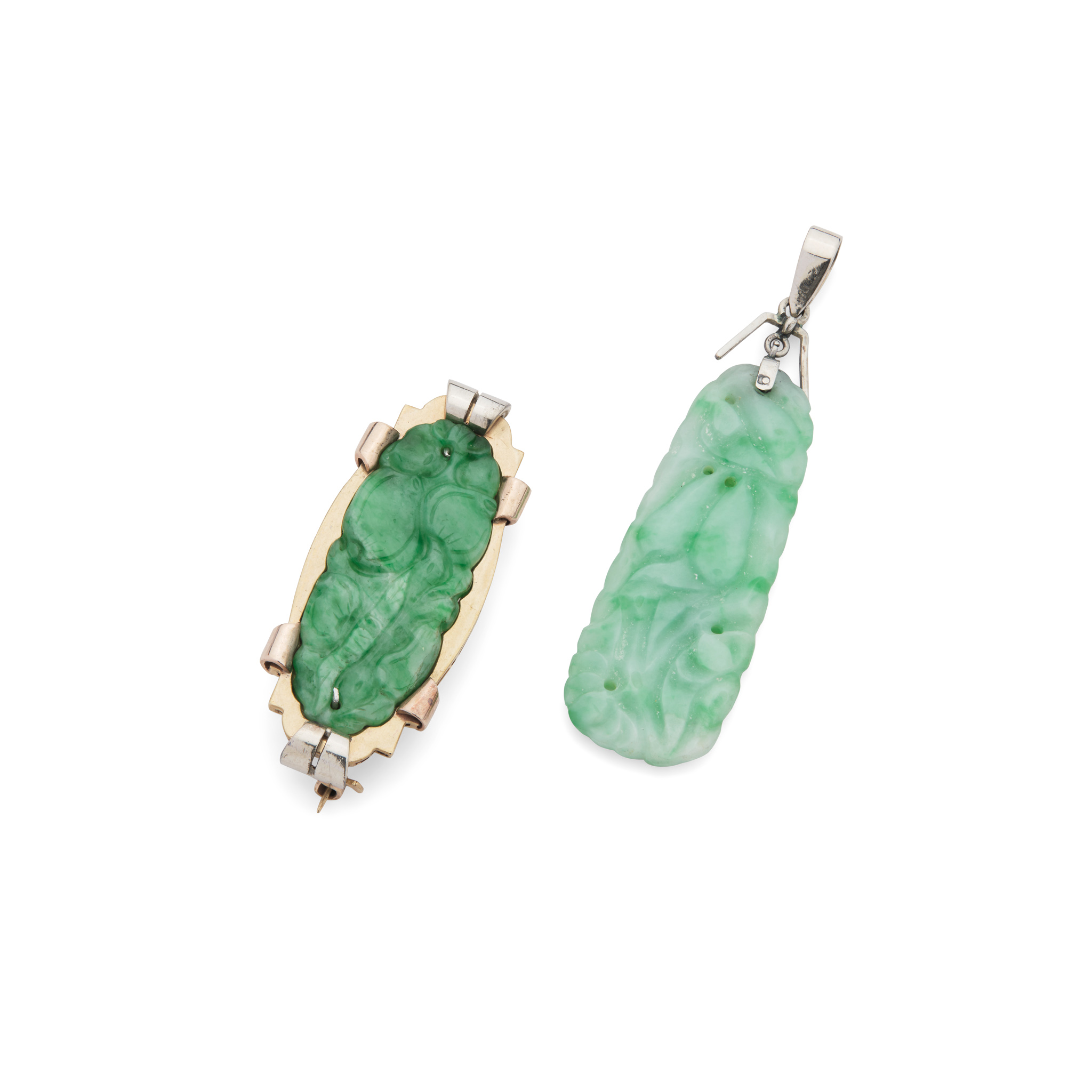 A carved jade brooch and pendant