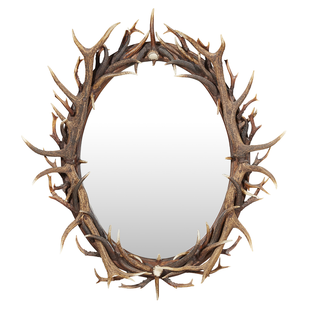 AN ANTLER FRAMED OVAL MIRROR