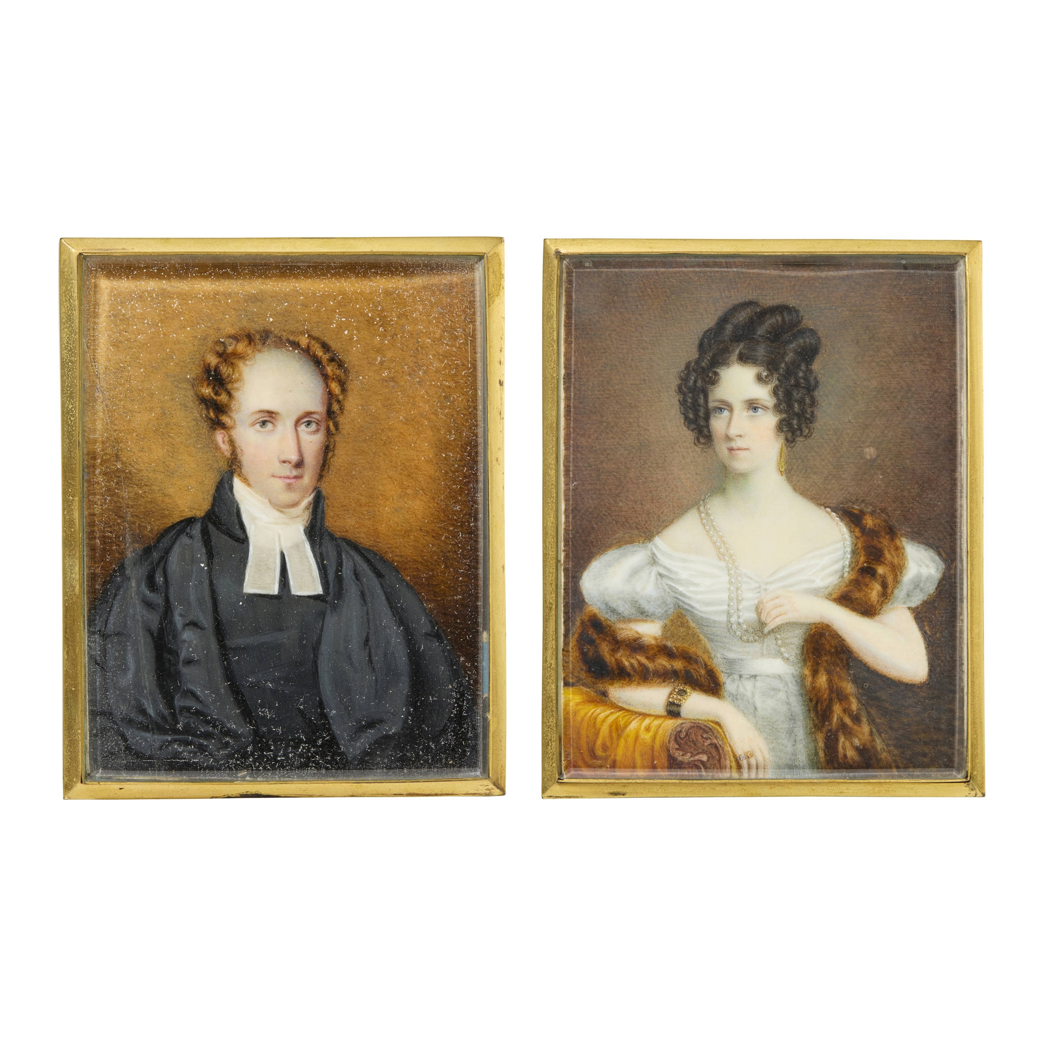 PAIR OF ENGLISH PORTRAIT MINIATURES OF A REVEREND AND LADY