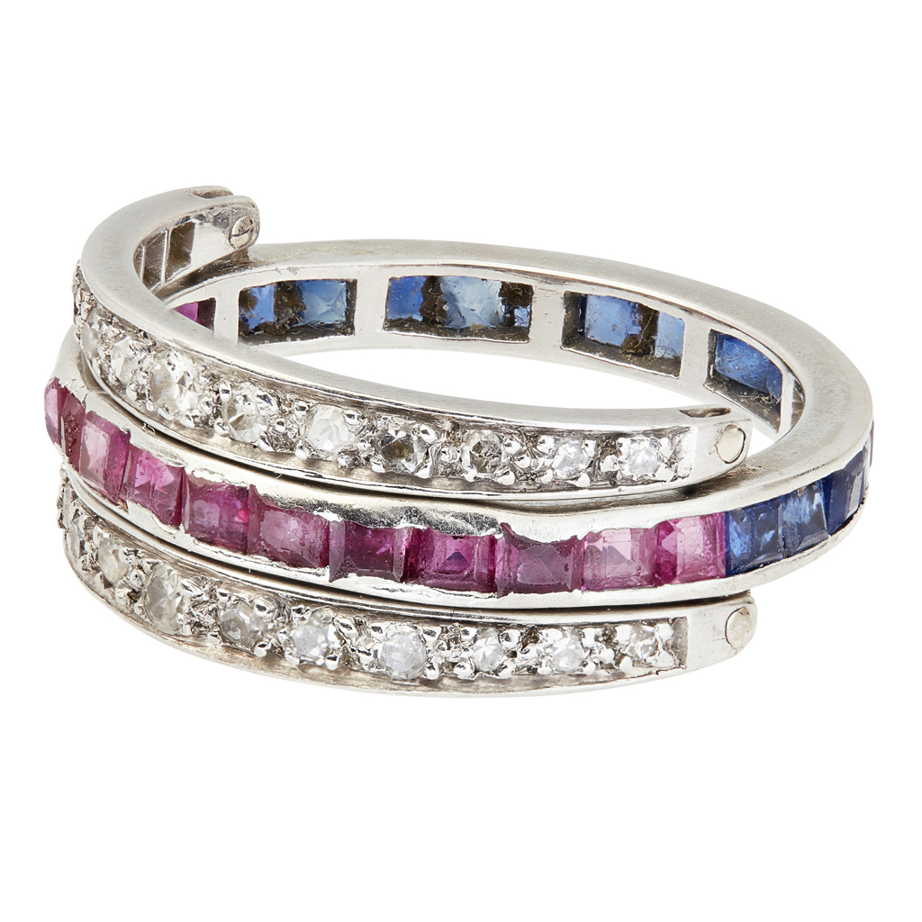 A gem set swivel ring