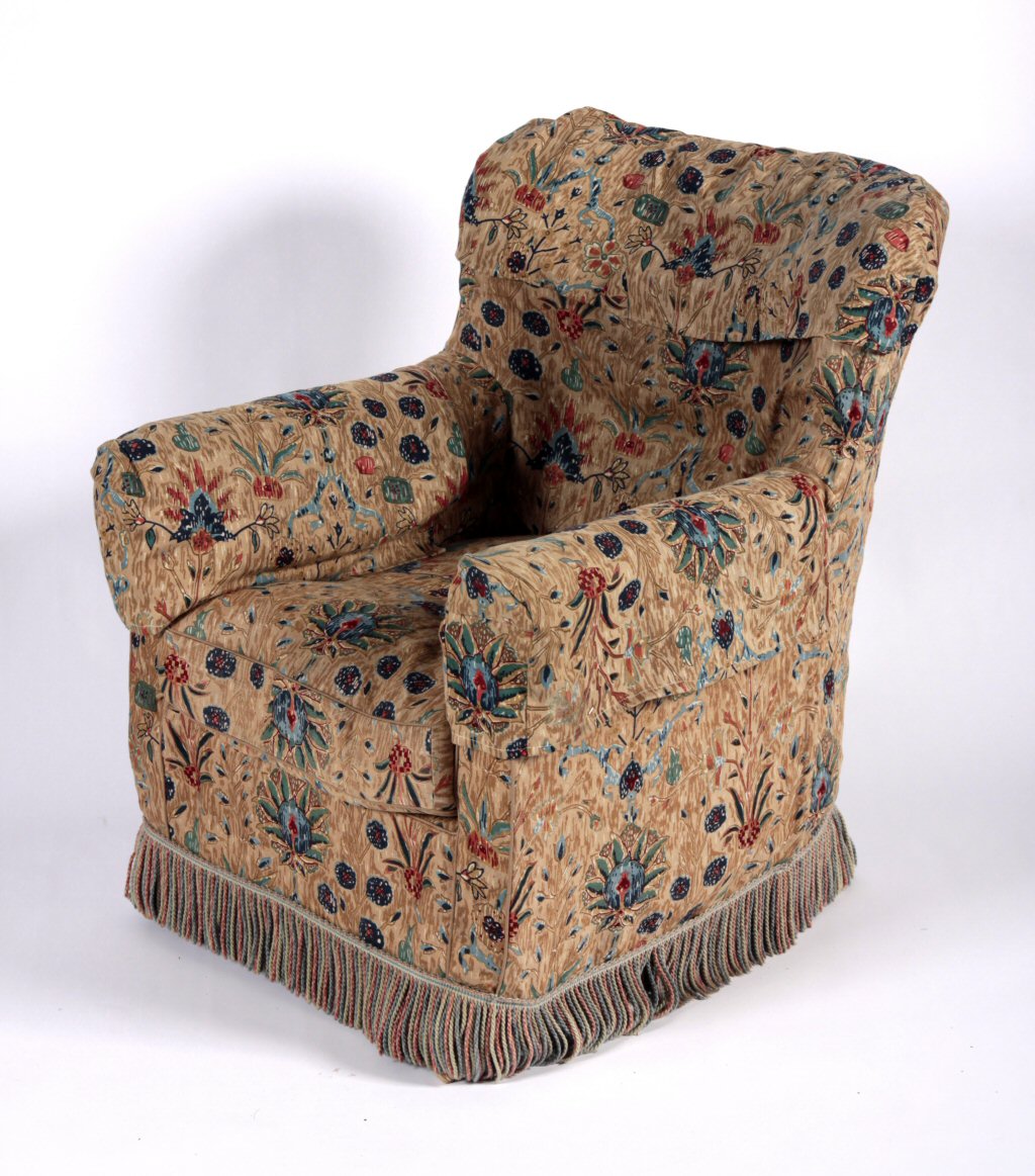 A Victorian mahogany button back armchair