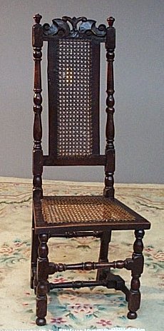 A 19th century Carolean style high back chair