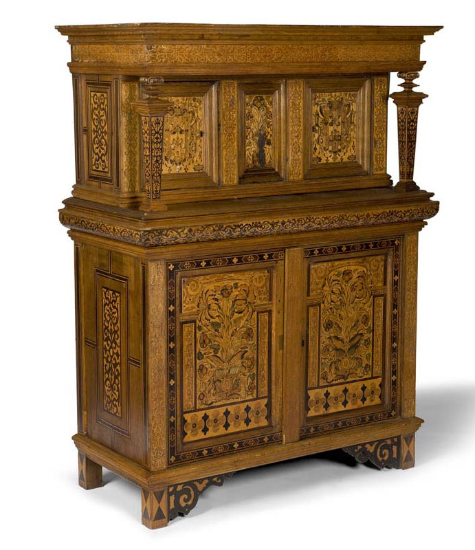 A German oak inlaid and marquetry panel press cupboard, 17th century and later