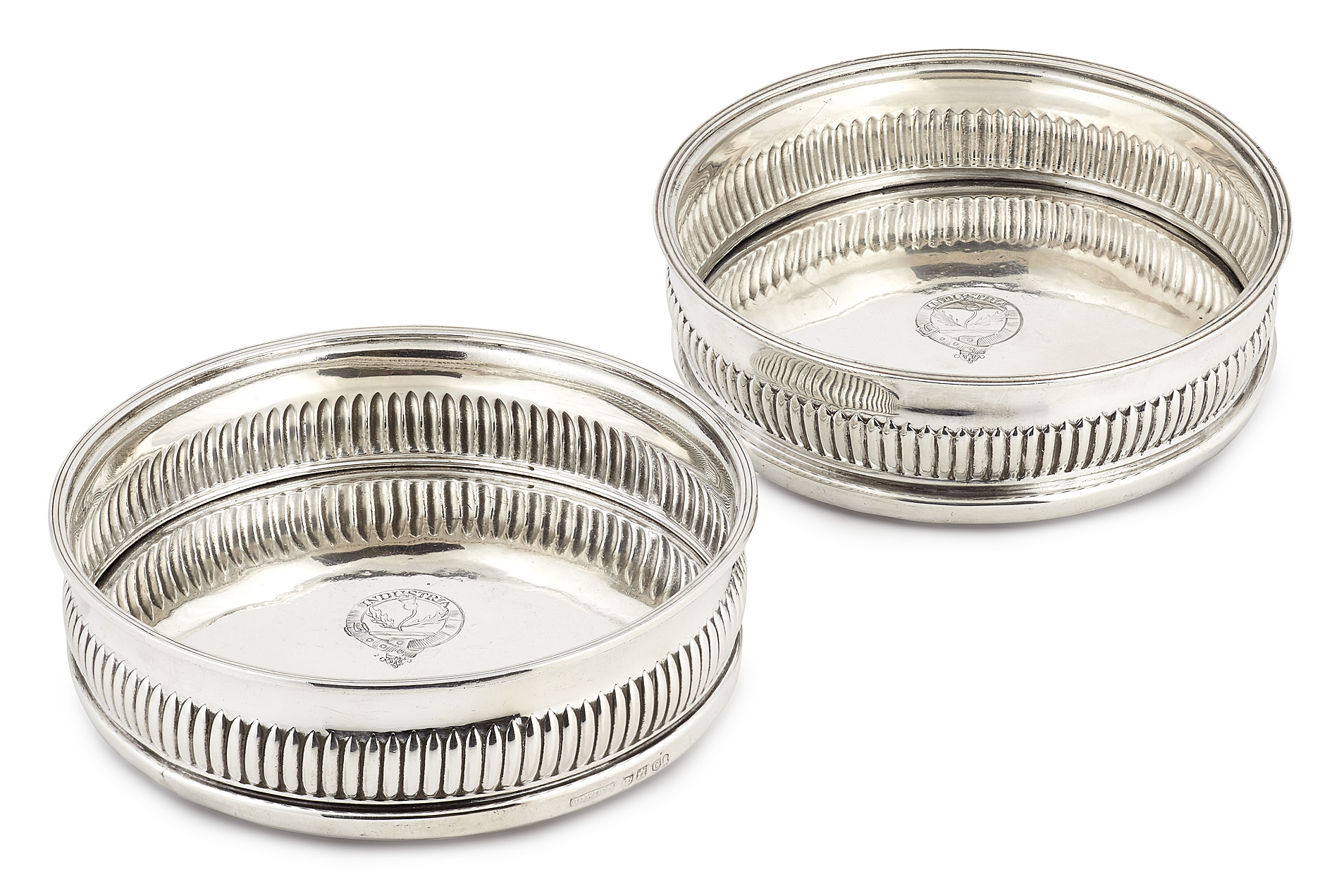 A pair of George III wine coasters