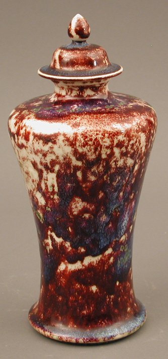 A Ruskin high fired vase and cover