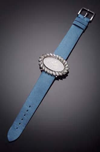 Corum - a lady's diamond set cocktail watch,