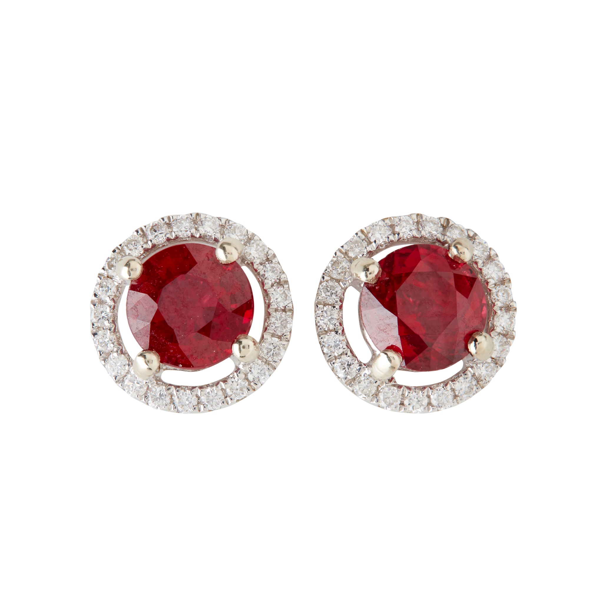 A pair of ruby and diamond set cluster earrings