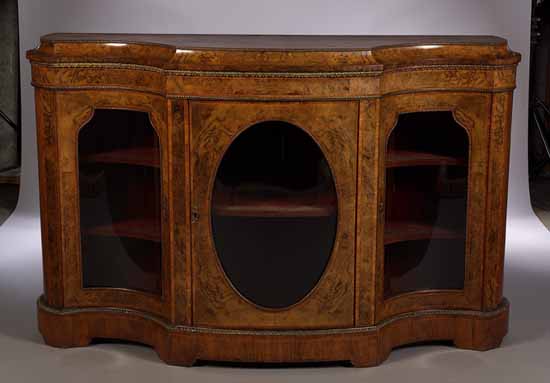 A Victorian walnut serpentine bowfront credenza