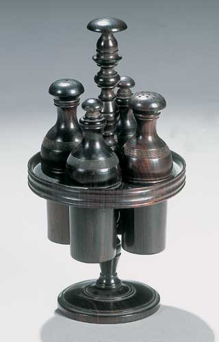 A 19th century treen cruet stand