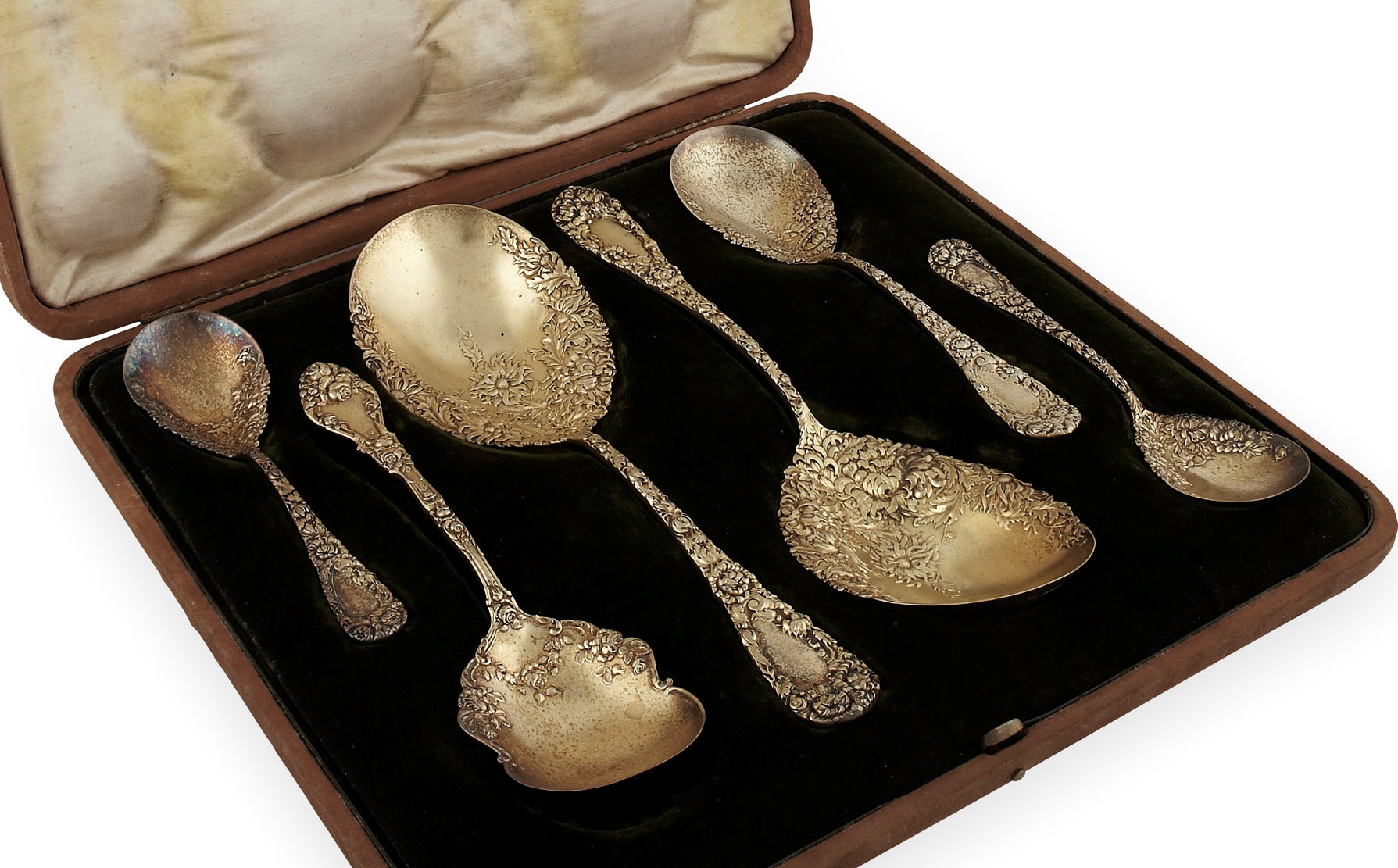 A cased set of silver gilt American berry spoons
