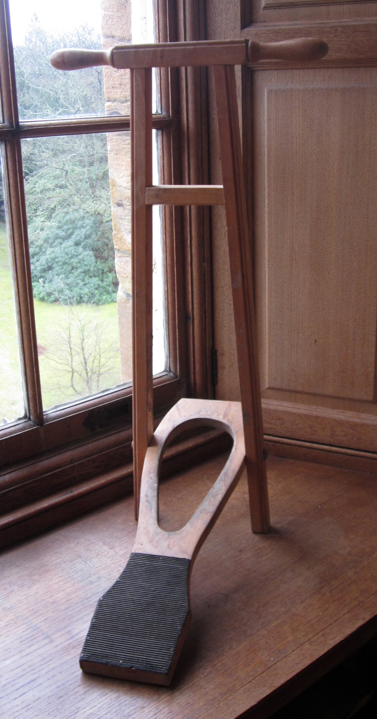 THREE WOODEN BOOT JACKS