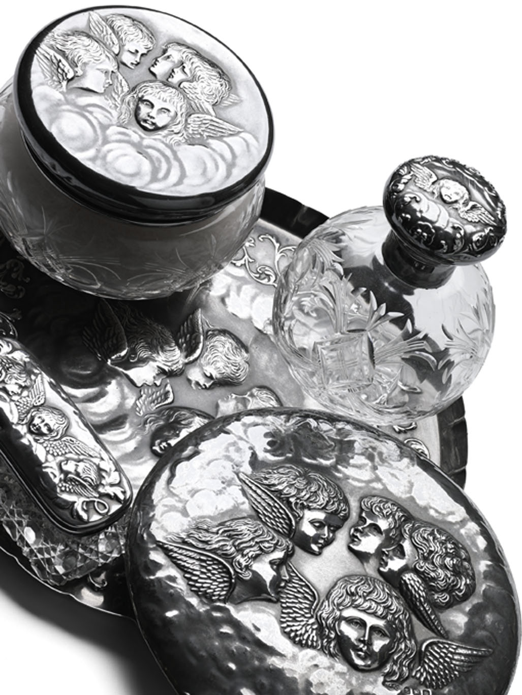 A comprehensive matched 'cherub' dressing table set