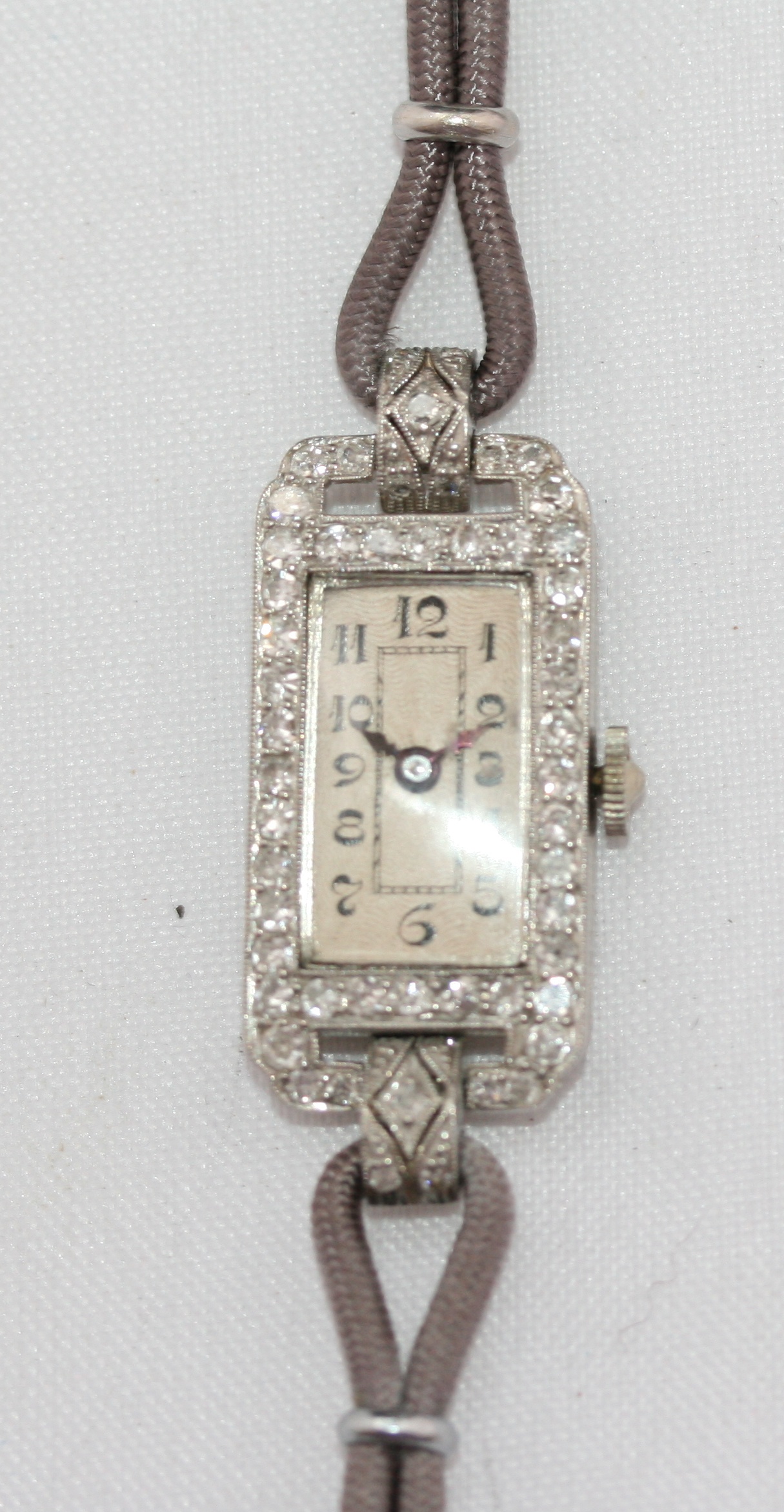 Past auction: An Art Deco platinum and diamond set cocktail watch