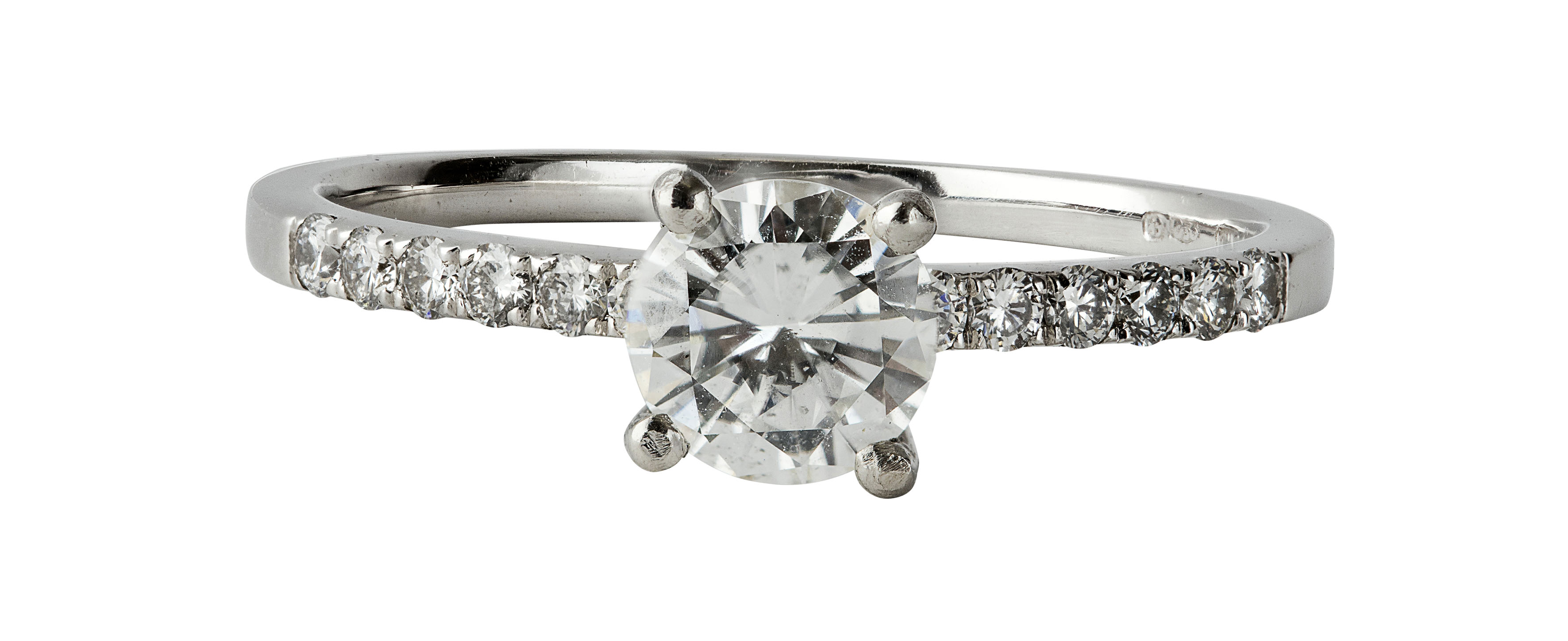 A platinum set diamond solitaire ring