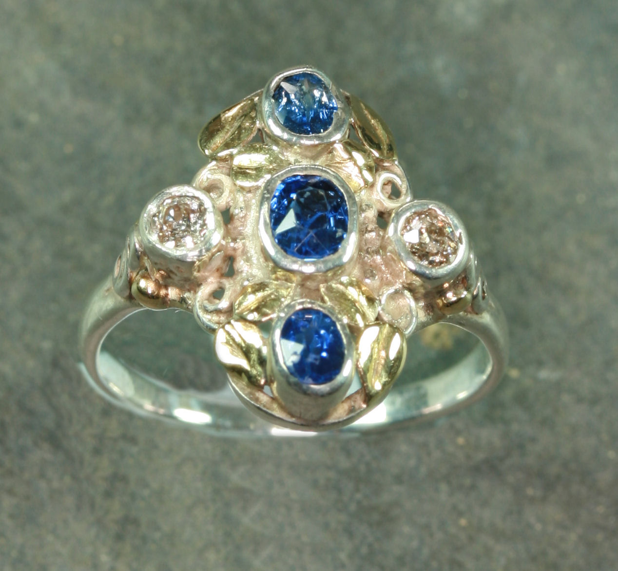 A sapphire and diamond cluster ring,