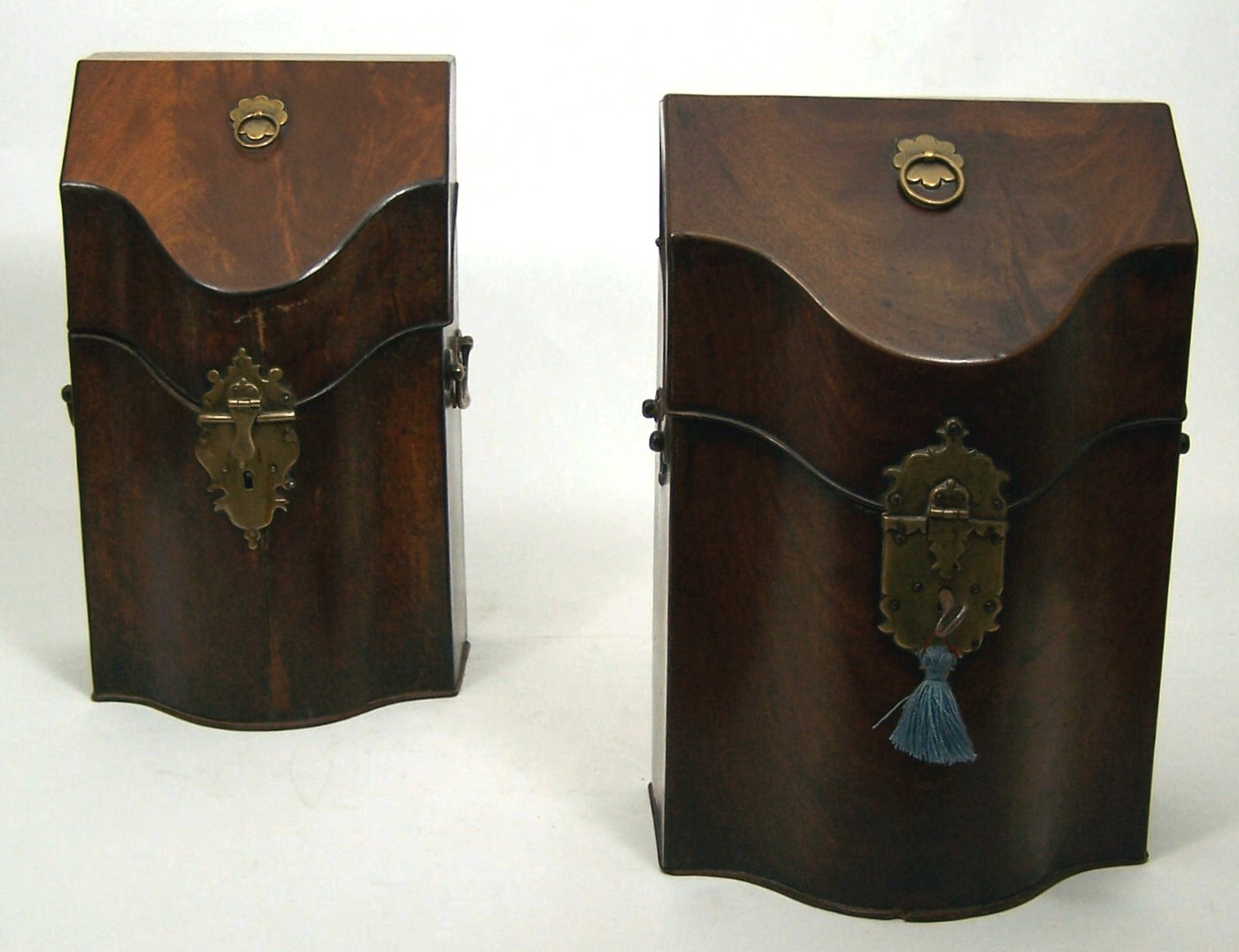 A near pair of George III period mahogany cutlery boxes