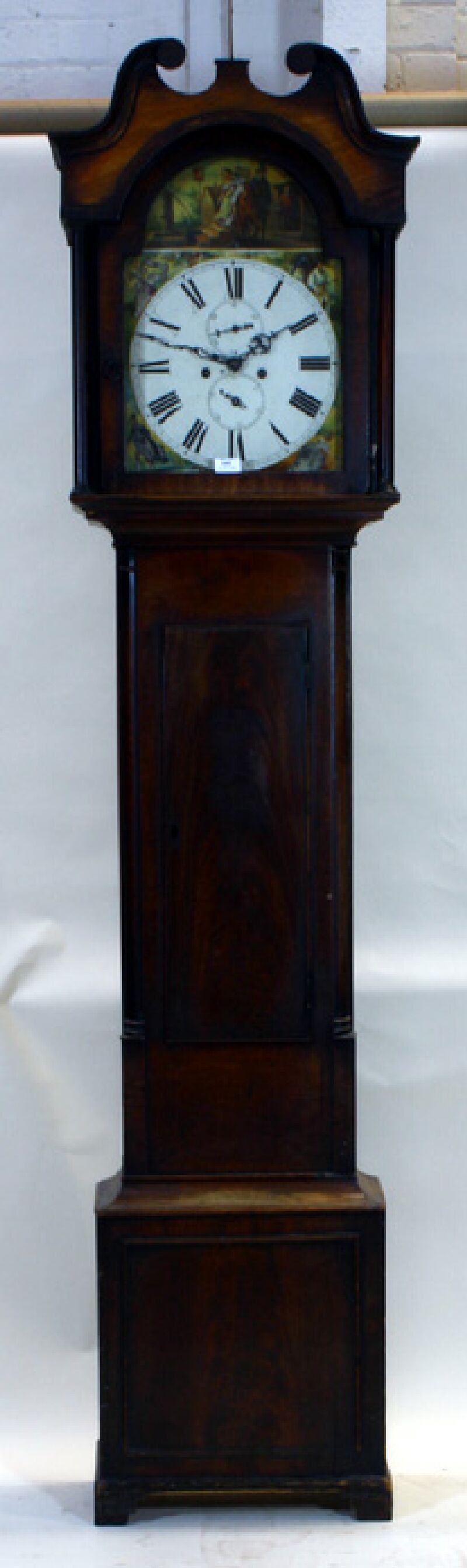 An early 19th century mahogany longcase clock