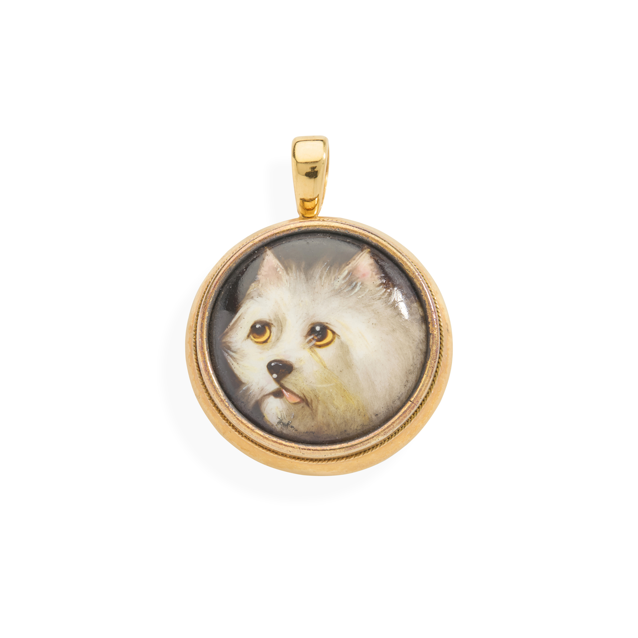 A mid 19th century enamel dog pendant