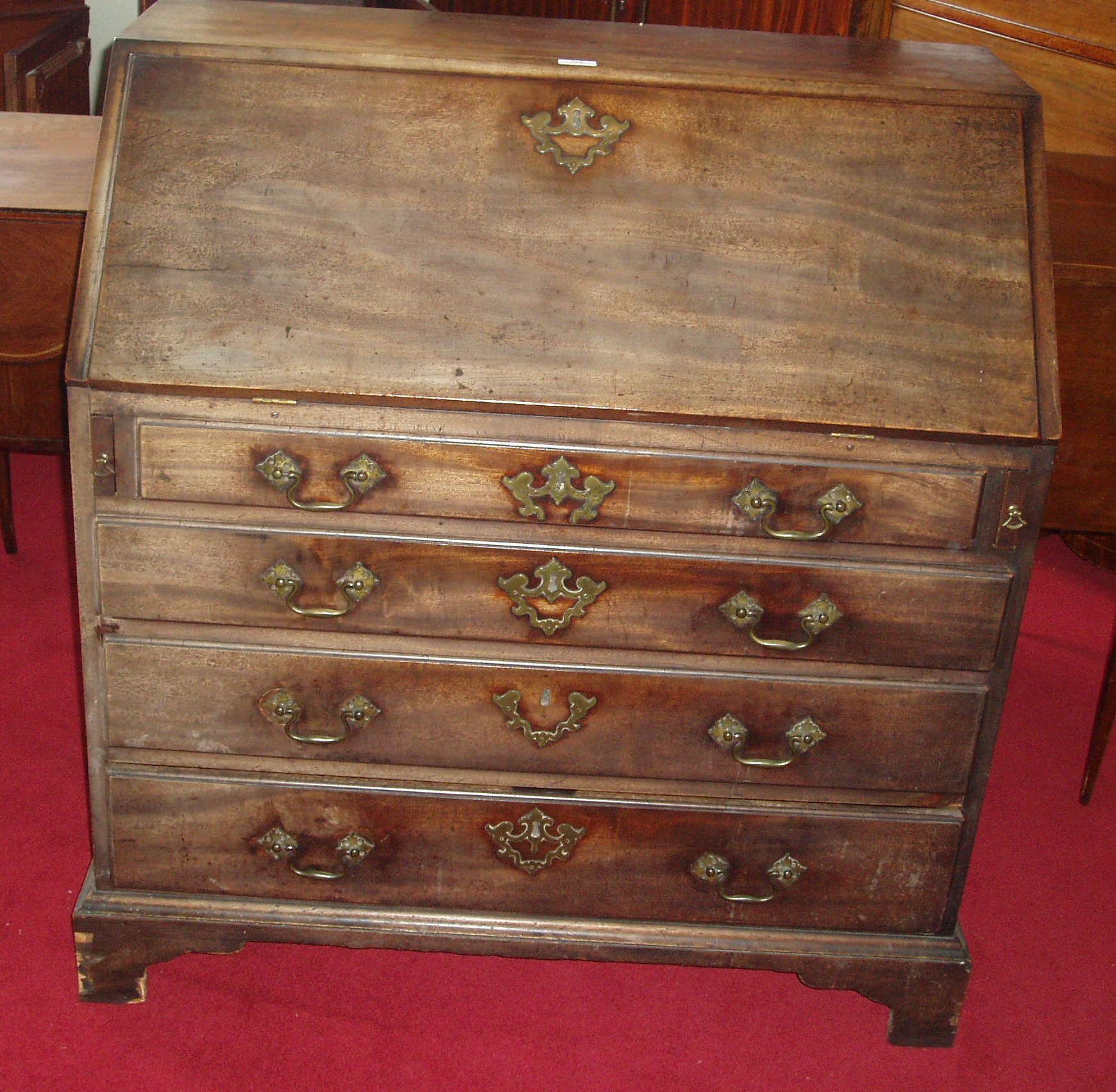 A George III mahogany bureau,