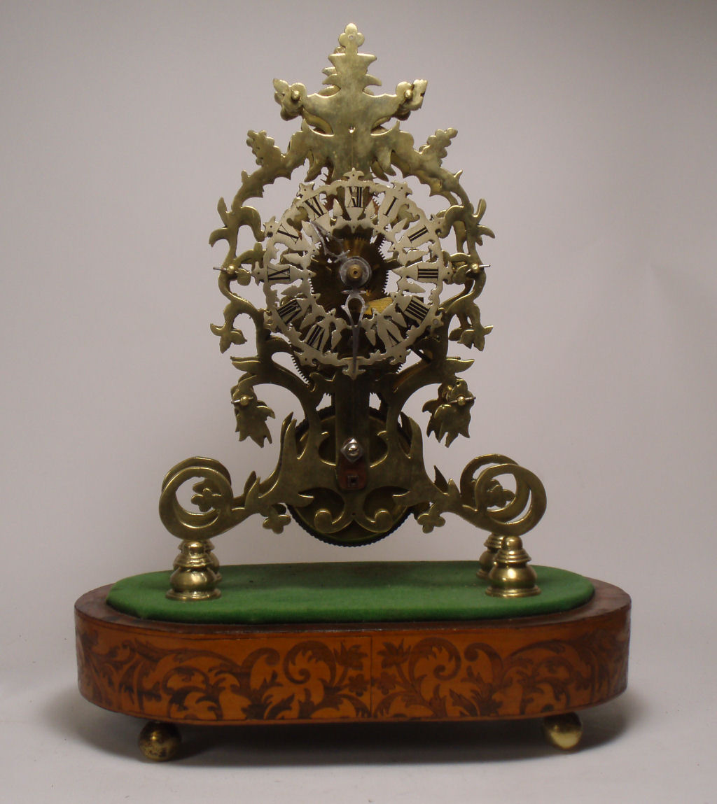 A 19th century brass skeleton clock