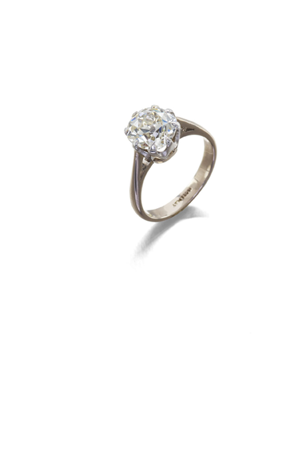 An 18ct gold and platinum mounted diamond single-stone ring,