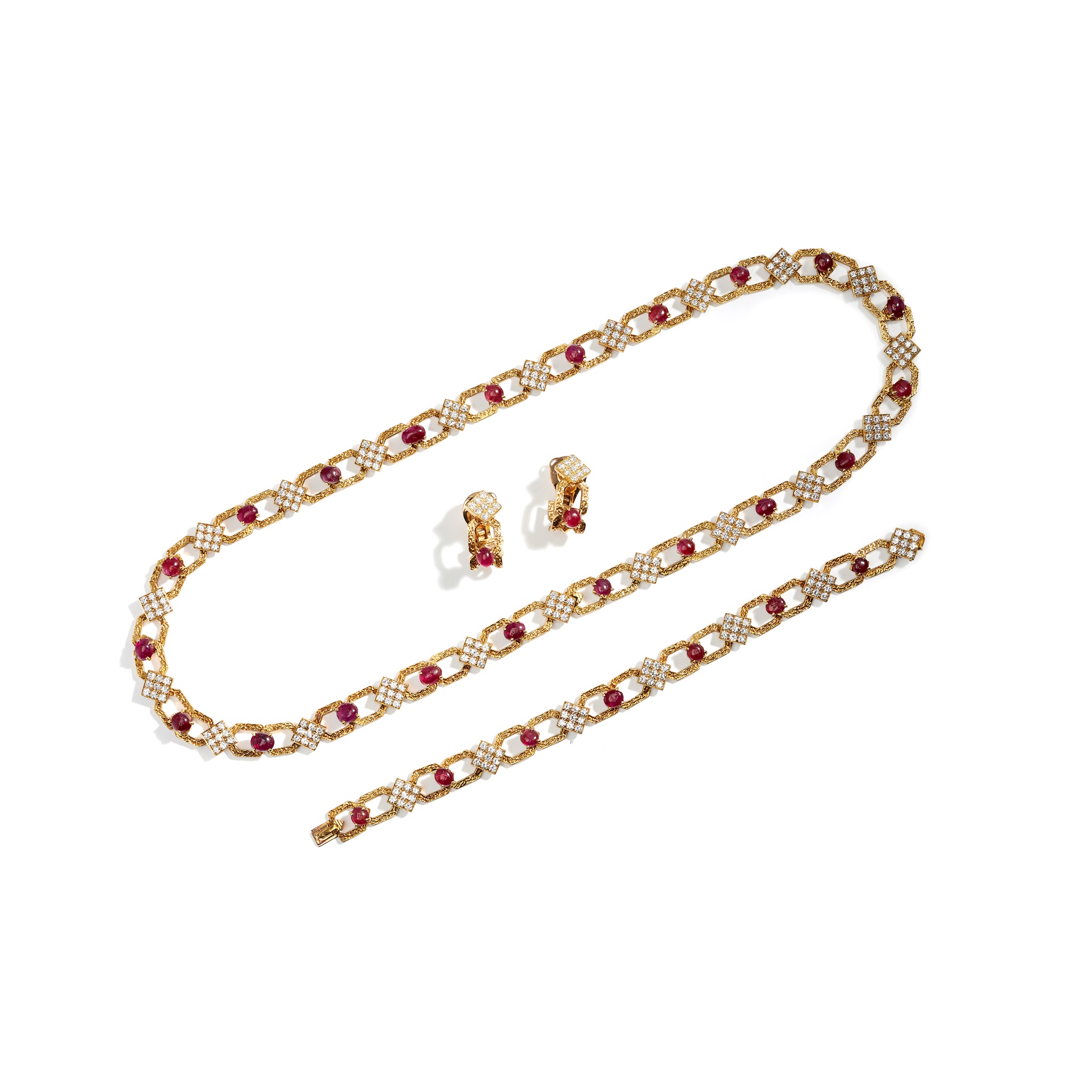 A ruby and diamond-set necklace, bracelet and pair of earrings, by M. Gerard, 1970s
