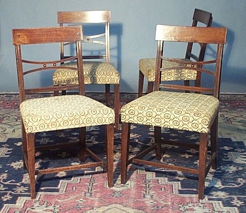 A set of four Regency style bar back dining chairs