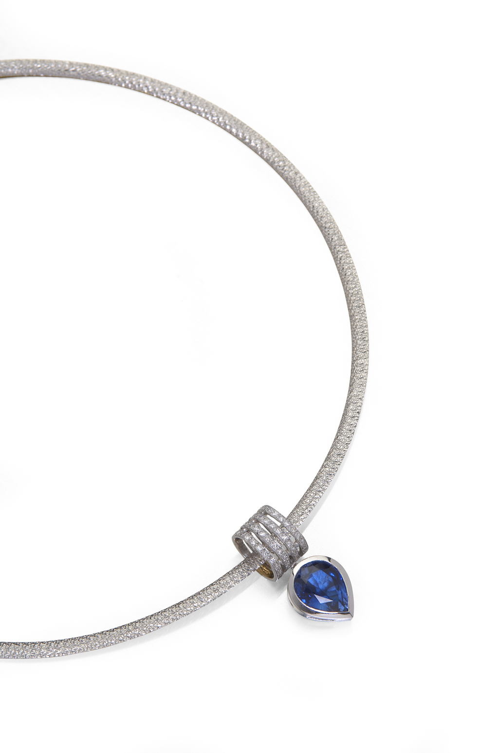 A sapphire and diamond pendant,
