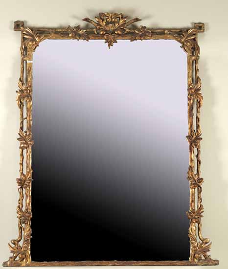 A large giltwood overmantel