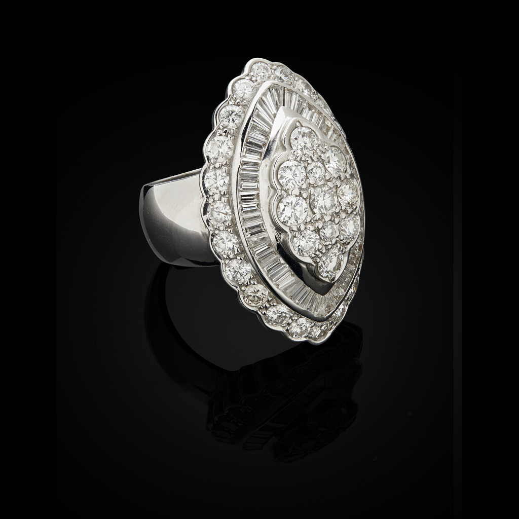 A diamond set cluster ring