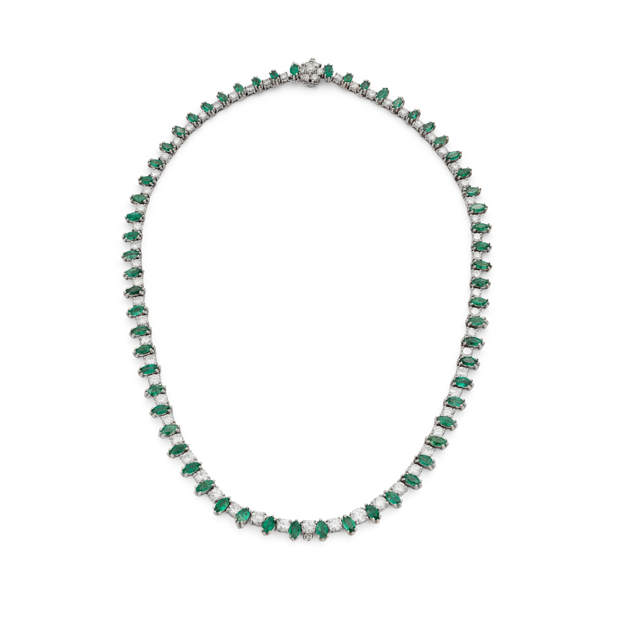 An emerald and diamond line necklace