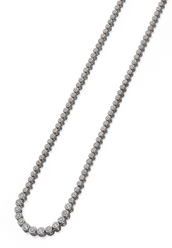 A diamond riviere necklace,