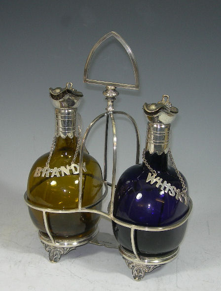 A pair of Victorian decanters on stand