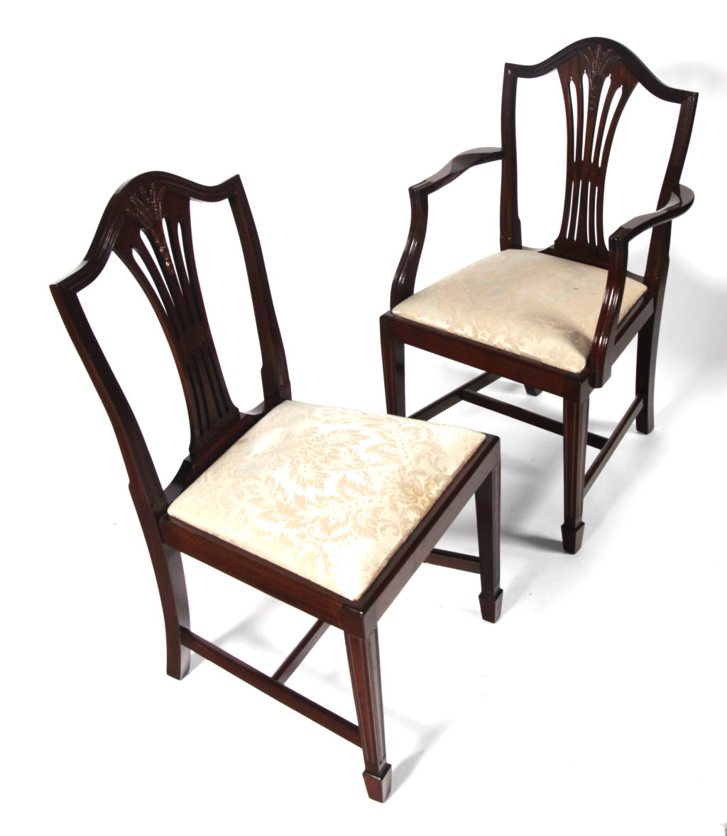 A set of ten Hepplewhite style mahogany dining chairs