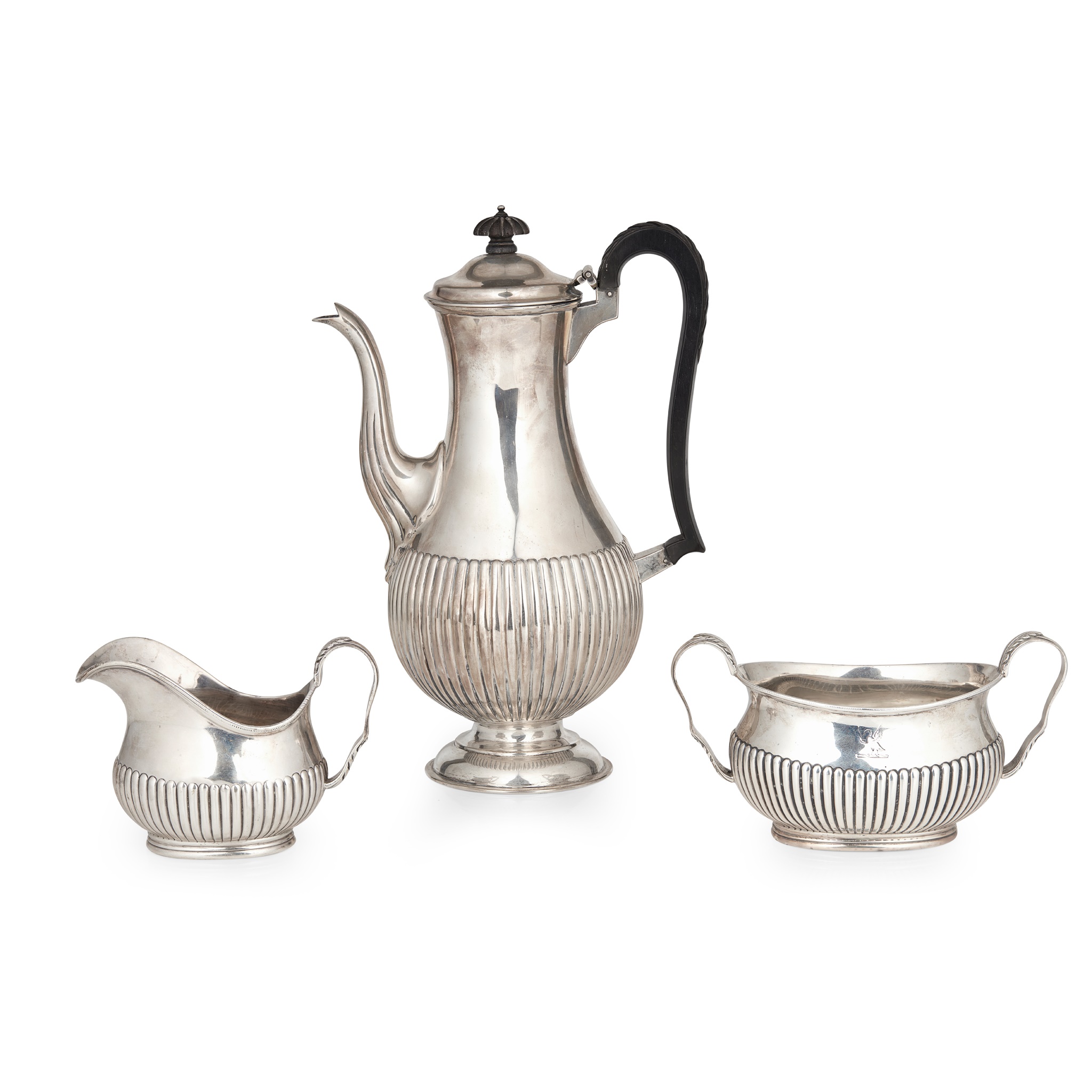 A Victorian coffee pot, sugar, and cream jug