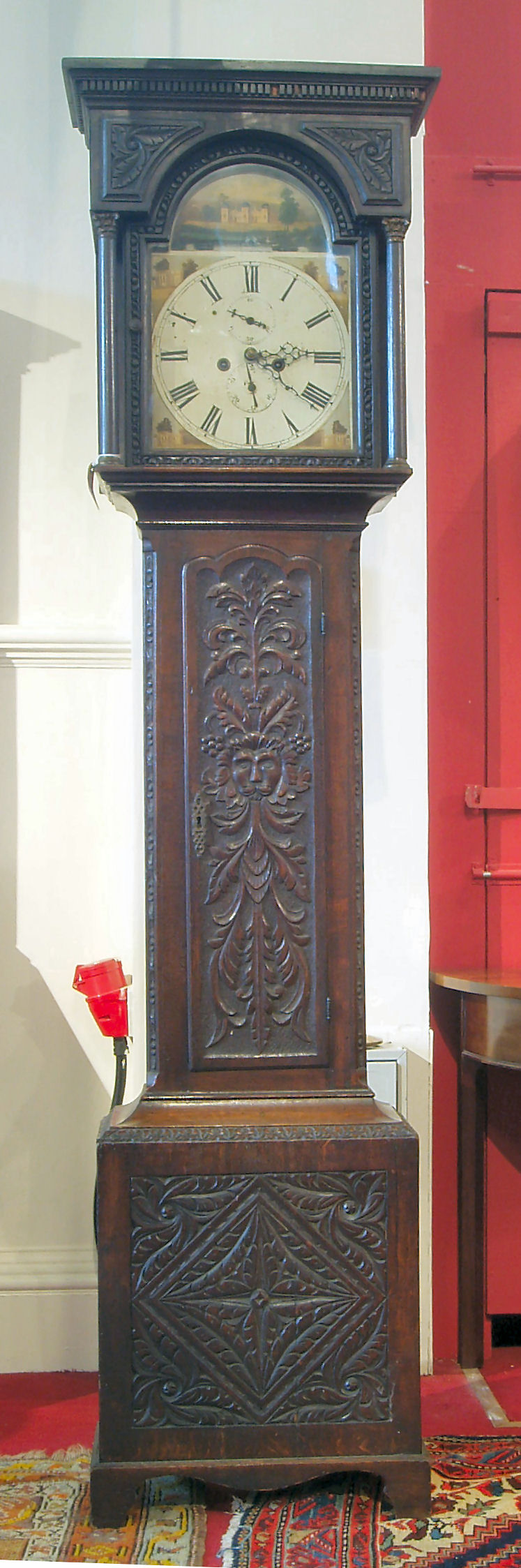 A George III period oak longcase clock