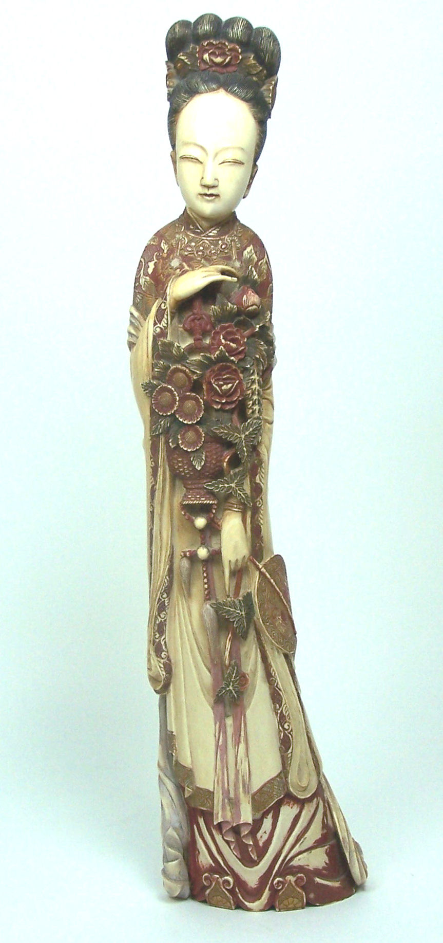 A large Japanese ivory figure of a bejin, Meiji or Taisho period