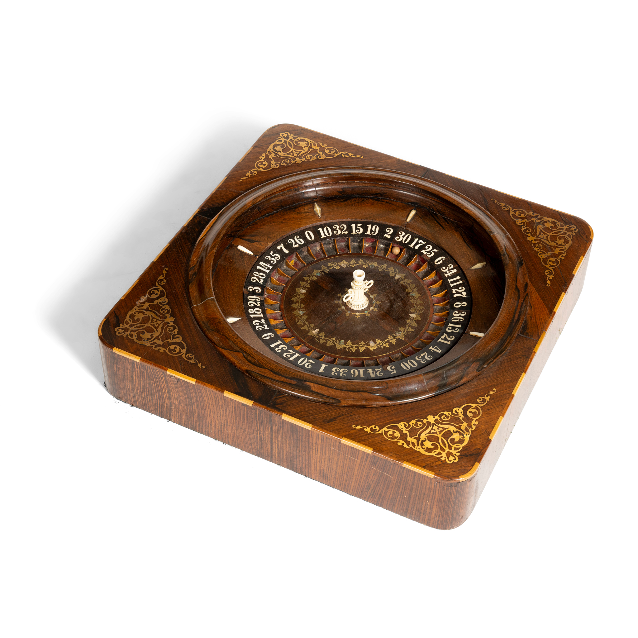 A ROSEWOOD AND MARQUETRY INLAID ROULETTE WHEEL
